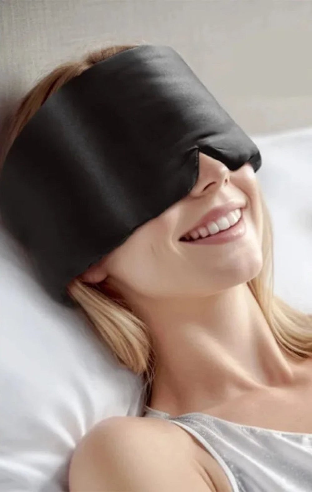 VelvetMoon silk sleep mask worn for a peaceful night's sleep